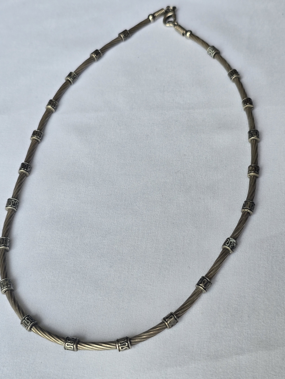 Vintage Silver-Tone Twisted Wire Necklace with Decorative Spacers